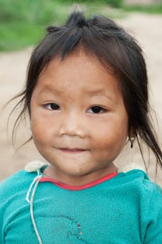 Portrait of asian girl,child with old clothes and dirty face