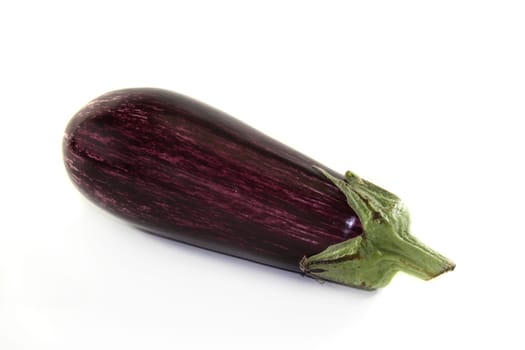 an eggplant in front of a white background
