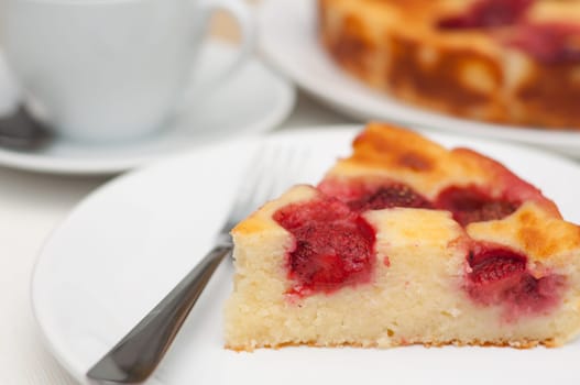Homemade Strawberry Pie and Cup of Coffee on the Table