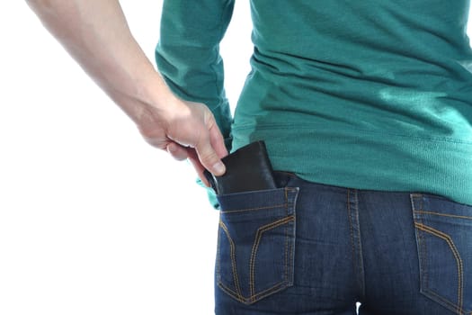 man pulls wallet out of a woman back pocket.