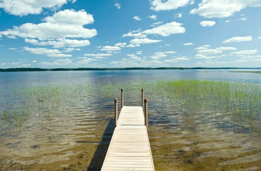 The view of lake with pier, taken in Finland