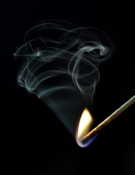 match flame with smoke and black background