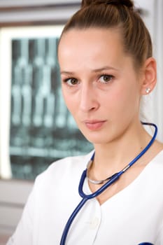 portrait of woman doctor in office - film scans in background