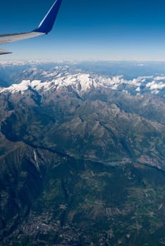 alps between switzerland and italy seen from the plane