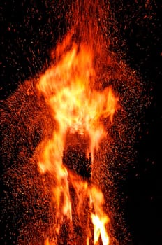 Flame with flying sparks