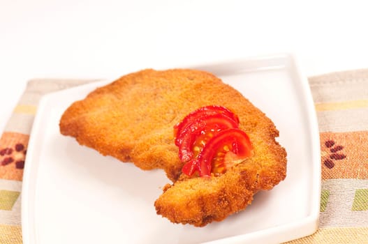 Schnitzel with tomato slices