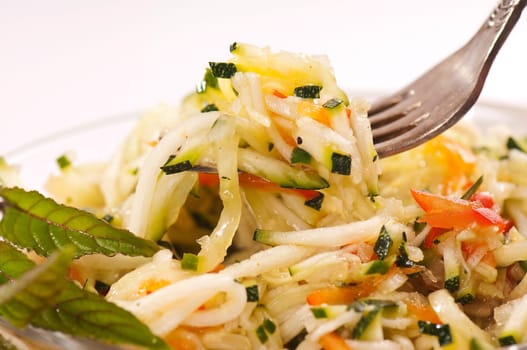 Zucchini salad in glass bowl
