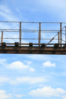Suspension bridge in front of blue,clear sky