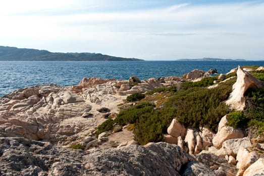 Pink granite rocks on the sea on La Maddalena in Sardinia