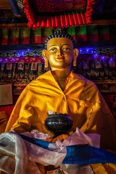 Buddha Sakyamuni statue in Spituk Gompa (Tibetan Buddhist monastery). Ladakh, India