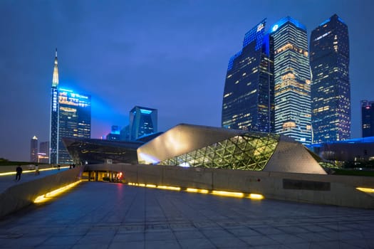 GUANGZHOU, CHINA - APRIL 27, 2018: Guangzhou Opera House designed by famous Iraqi architect architect Zaha Hadid illluminated at night