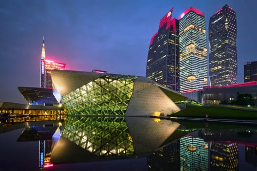 GUANGZHOU, CHINA - APRIL 27, 2018: Guangzhou Opera House designed by famous Iraqi architect architect Zaha Hadid illluminated at night