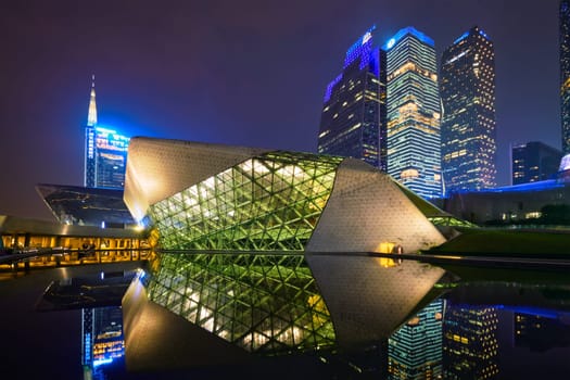 GUANGZHOU, CHINA - APRIL 27, 2018: Guangzhou Opera House designed by famous Iraqi architect architect Zaha Hadid illluminated at night