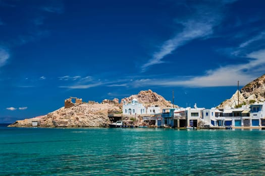 Greek village scenic picturesque view in Greece - the beach and fishing village of Firapotamos in Milos island, Greece