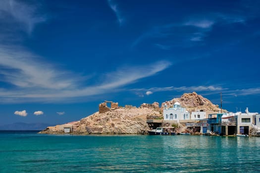 Greek village scenic picturesque view in Greece - the beach and fishing village of Firapotamos in Milos island, Greece
