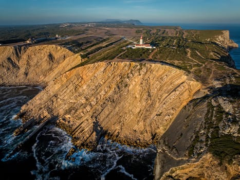 Aerial drone view of lighthouse on Cabo Espichel cape Espichel on Atlantic ocean