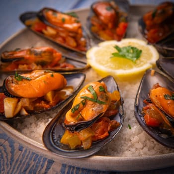 RECIPE FOR SPANISH MUSSELS WITH CHORIZO, WHITE WINE SAUCE, PEPPER, TOMATO, ONION. High quality photo