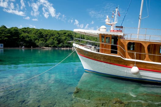 Anchored ship in clear waters of the Mediterranean Sea
