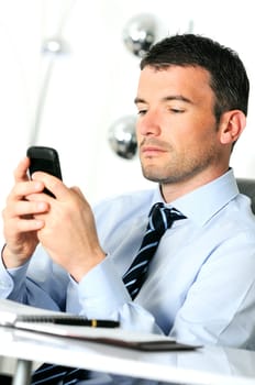 businessman is having a communication with his cellphone