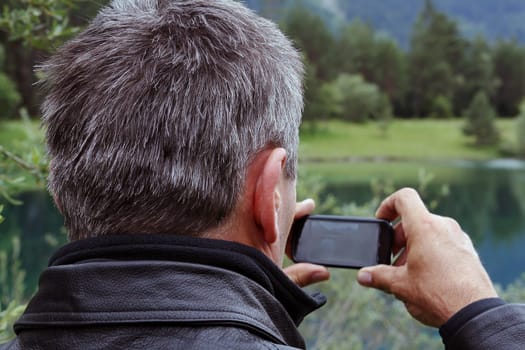 Good for making calls and taking pictures - a mobile phone!