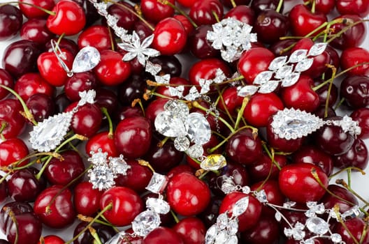 Jewels at fruit red ripe cherries berry background