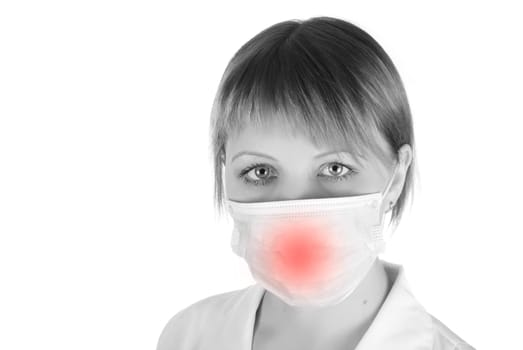 Closeup of a female healthcare professional (doctor/nurse) wearing a protection mask