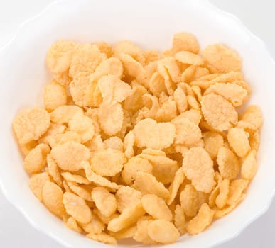 bowl of cornflakes isolated on a white background