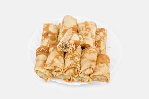 a pancakes with meat and rice on white