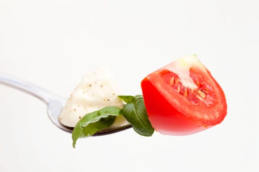 Fork with tomato mozzarella