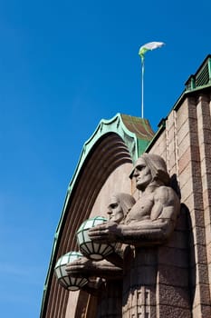 Main railway station in Helsinki, Finland. On a summer day with blue sky.