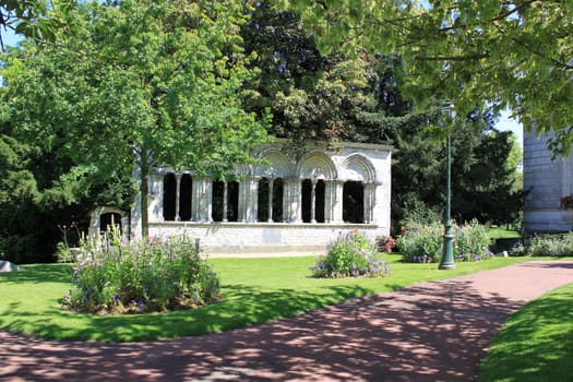 a park and flower garden with its historical monuments in the town of Montargis in France