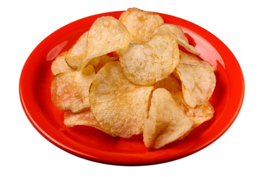 Deep fried salted potato crisps on a plate isolated with clipping path
