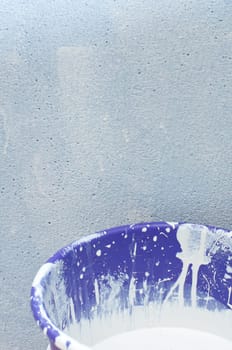 Background - House Improvement: Bucket With Paint in Front of Wall