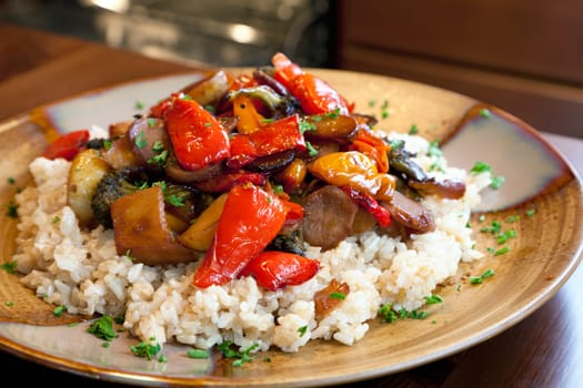 A healthy vegan dinner of brown rice and roasted vegetables