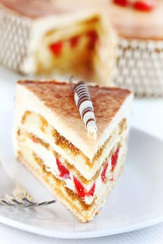Delicious Tiramisu birthday cake with cherries