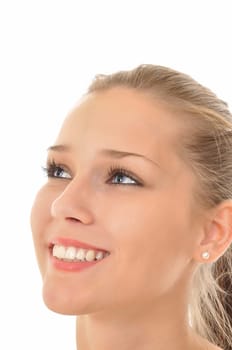 Pretty woman with blue eyes looking into the sky