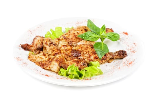 fried chicken filet meat with greens and lettuce