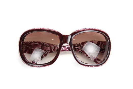 Modern sunglasses isolated on a white