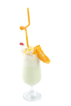 milk fruit cocktail with slice of orange cream and pipe
