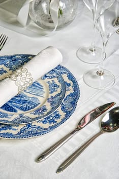 Holiday place setting with napkin, fork and knife