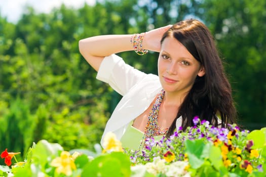 Summer garden colorful flowers beautiful woman romantic look
