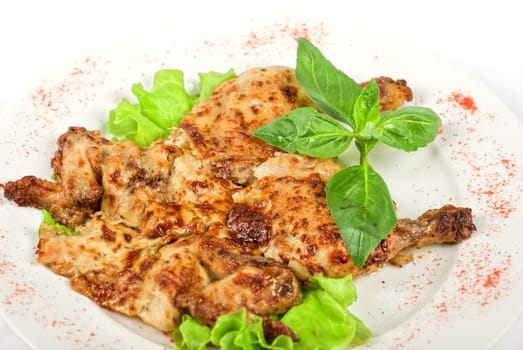 roasted chicken meat with lettuce and greens