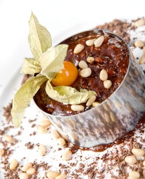 Chocolate risotto dessert closeup isolated on a white background