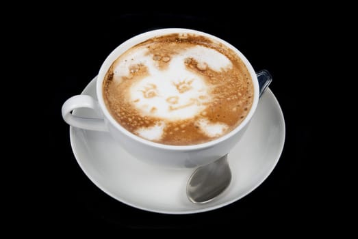 Cup of latte on a dark background