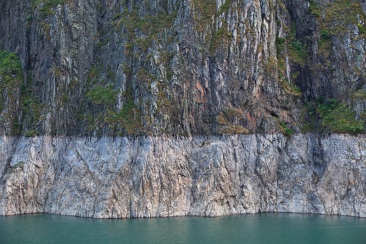 a high mountain slope on the lake