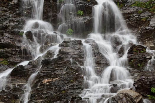 texture of flowing water on a stone mountain