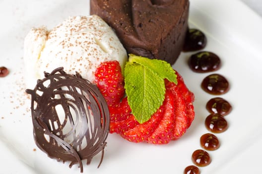 Chocolate flan with strawberries and chocolate, a wonderful dessert