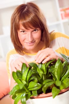 portrait of woman with home plants