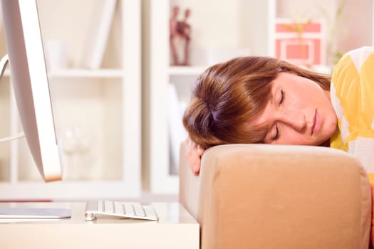 young woman have a break in front of computer