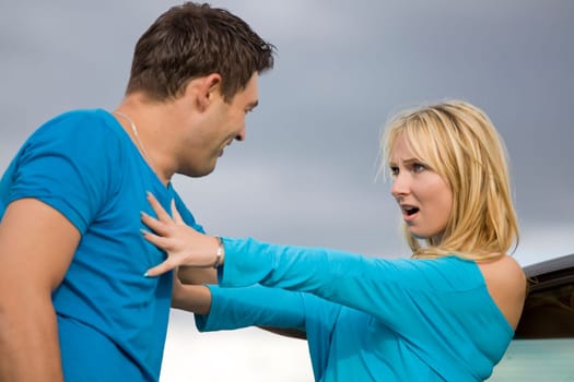 Young couple - conflict in relationship, problems, harassment, disagreement